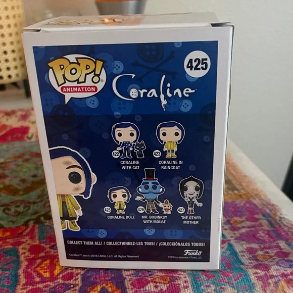 Funko Coraline Doll in Yellow and Blue - Picture 3 of 5